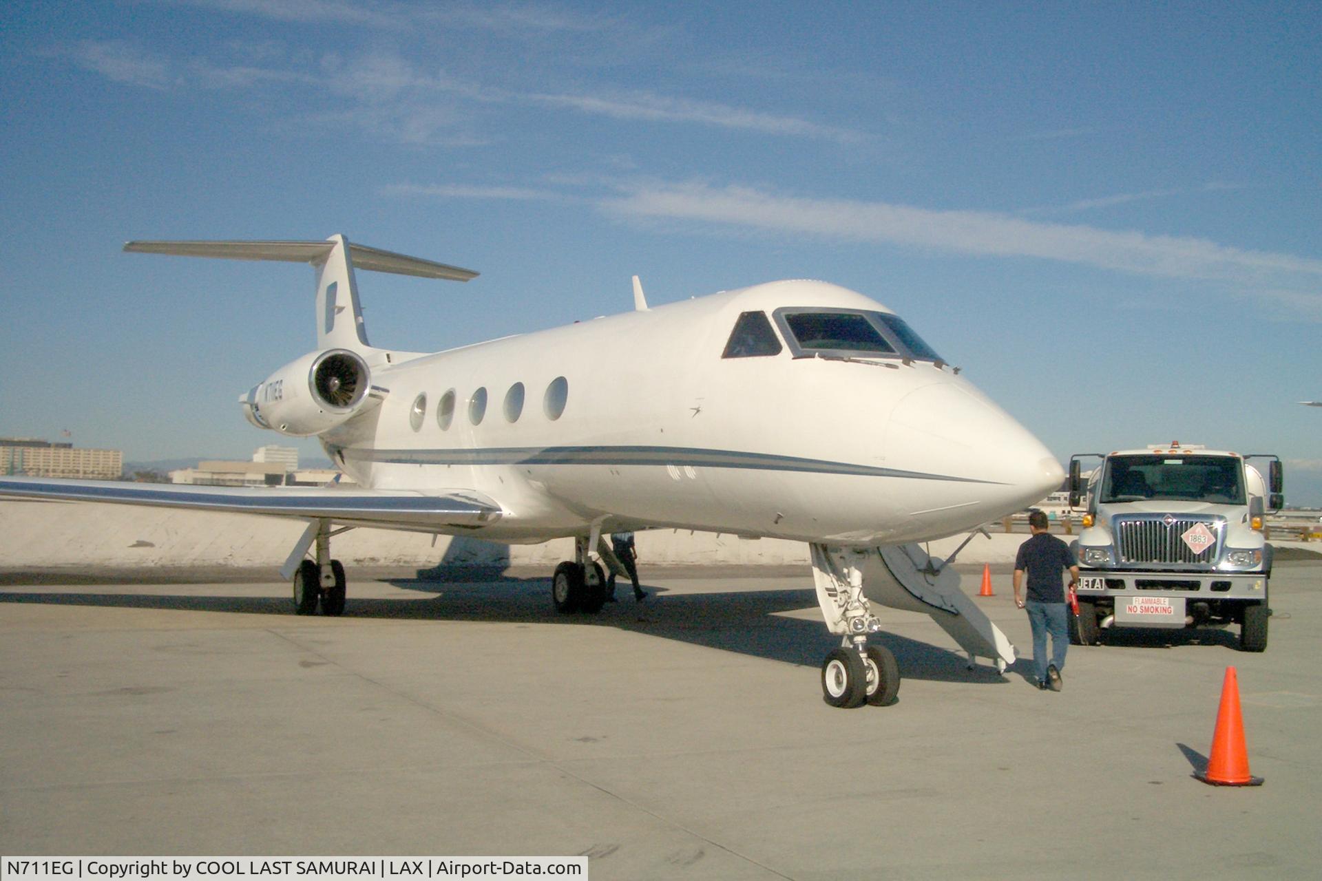 N711EG, 1982 Gulfstream American G-1159A Gulfstream III C/N 349, GIII, N711EG at LAX Land Mark.