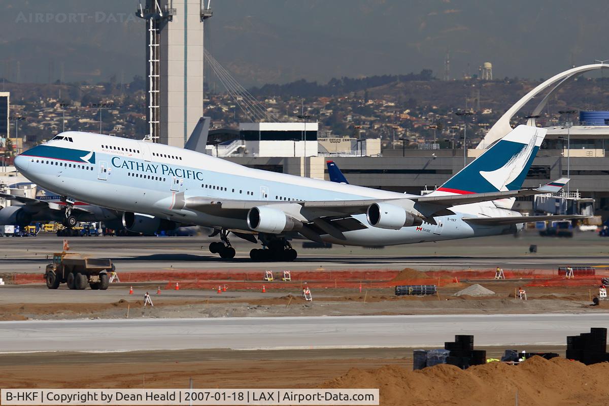 B-HKF, Boeing 747-412 C/N 25128, Cathay Pacific B-HKF (FLT CPA885) departing RWY 25R enroute to Hong Kong Int'l (VHHH).