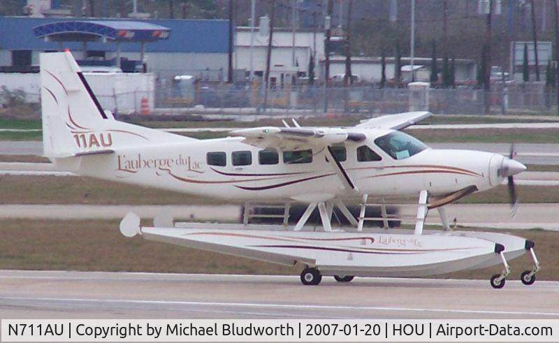 N711AU, 1990 Cessna 208 Caravan I C/N 208-00175, Casino float plane leaving for La Lac
