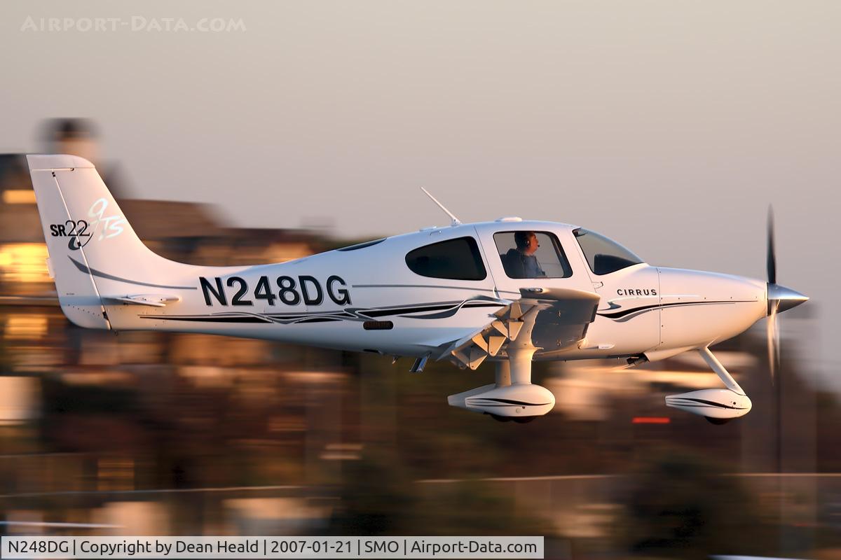 N248DG, 2005 Cirrus SR22 GTS C/N 1359, 2005 Cirrus SR-22 N248DG over the numbers on RWY 21 late in the day.
