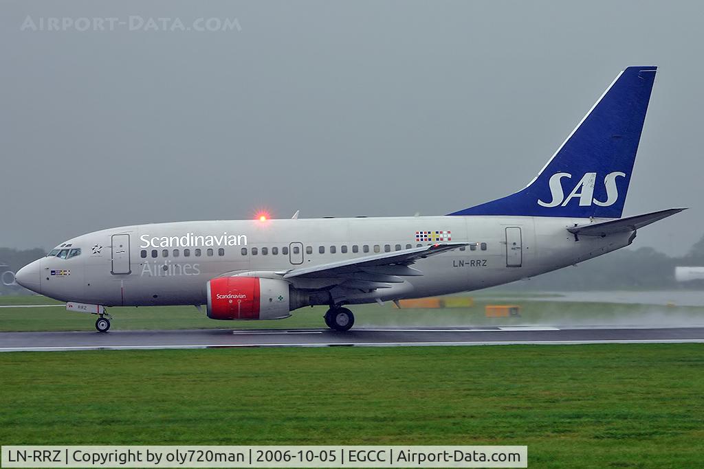 LN-RRZ, 1998 Boeing 737-683 C/N 28295, Rolling on a misty rainy day