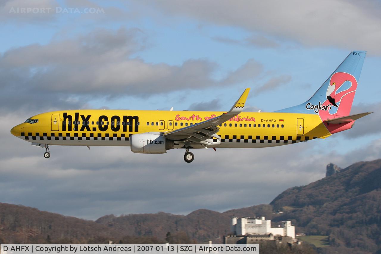 D-AHFX, 2001 Boeing 737-8K5 C/N 30416, Hapag-Lloyd Express, Boeing 737-8K5(WL), at background Salzburg Castle (Hohensalzburg)