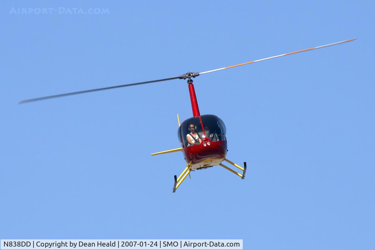 N838DD, 2000 Robinson R44 Raven C/N 0838, Celebrity Helicopter's 2000 Robinson R44 N838DD, piloted by an attractive young lady, coming in for a landing at the helipad at Santa Monica Municipal Airport.
