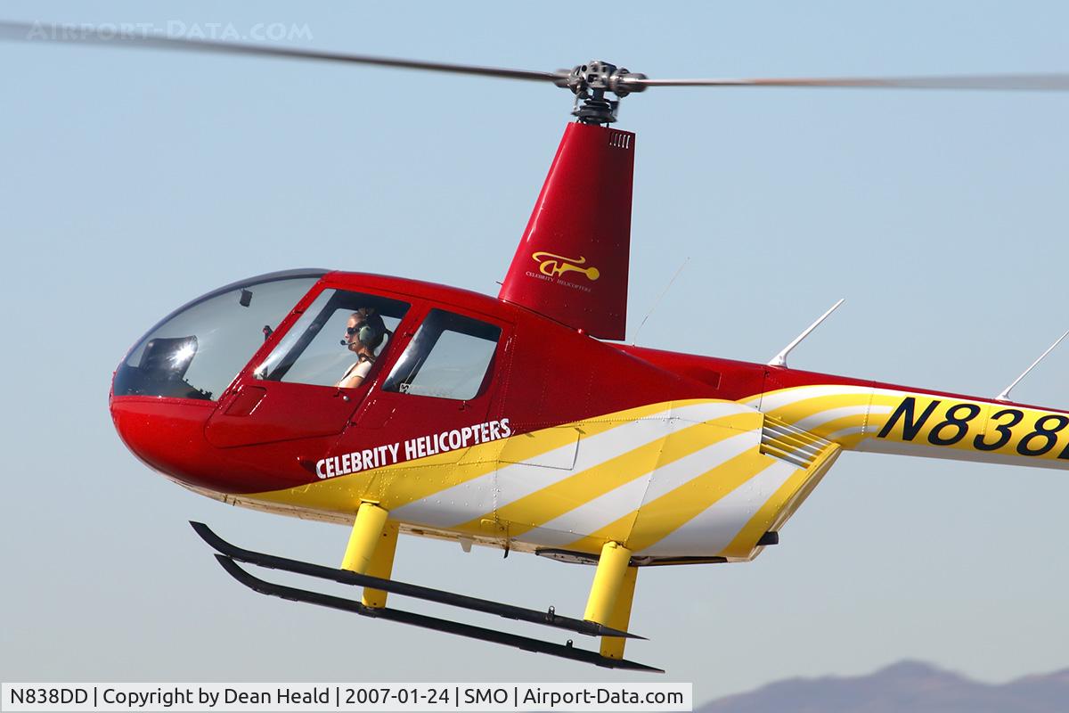 N838DD, 2000 Robinson R44 Raven C/N 0838, Close-up of Celebrity Helicopter's 2000 Robinson R44 N838DD, piloted by an attractive young lady, coming in for a landing at the helipad at Santa Monica Municipal Airport.