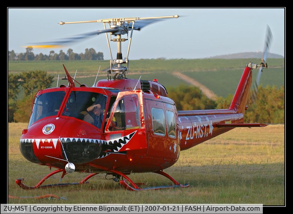 ZU-MST, 1967 Bell UH-1H Iroquois C/N 10071, She is now operating temporarily from Stellenbosch (FASH) supporting fire fighting operations in the Western Cape during the summer season. Current colour scheme was apparently done for a movie shoot. Condition, beautiful, sound, emotional.............