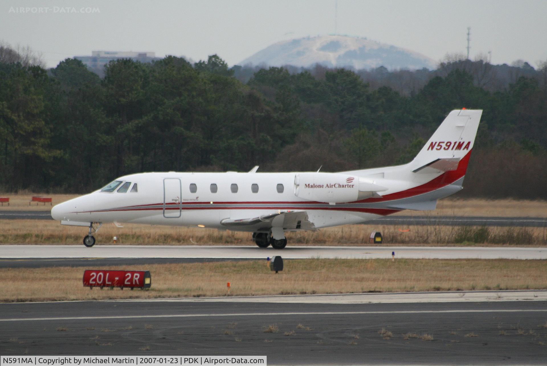 N591MA, 2001 Cessna 560XL C/N 560-5163, Departing PDK enroute to TEB