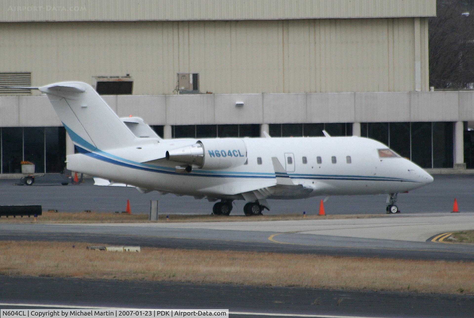 N604CL, 2003 Bombardier Challenger 604 (CL-600-2B16) C/N 5570, Tied down @ Signature Flight Support