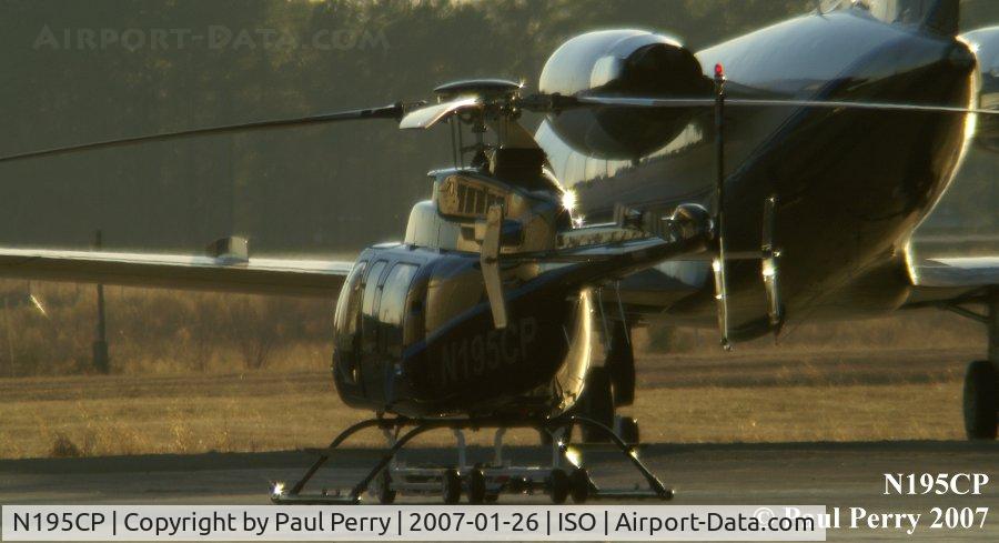 N195CP, 2004 Bell 407 C/N 53606, Cast in the golden sunset, resting on a tow trolley