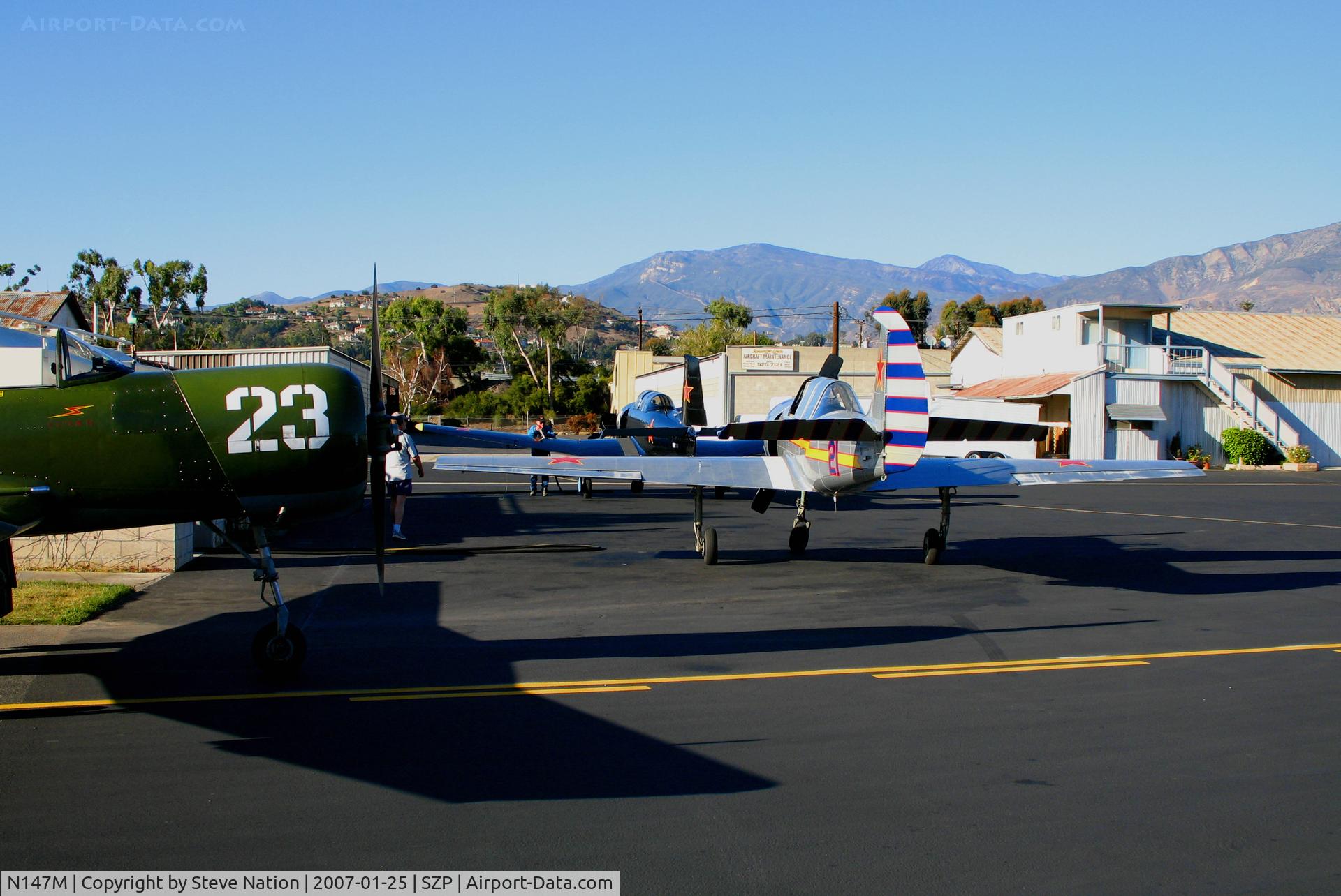N147M, Nanchang CJ-6A C/N 4232020, Nanchang CJ-6A #23 with YK-52 NX6294D #21 and CJ-6A N9278F #15 @ Santa Paula Airport, CA