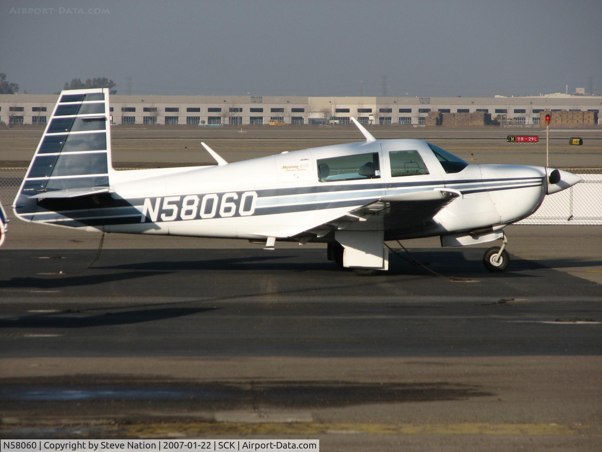 N58060, 1985 Mooney M20J 201 C/N 24-1538, Pacer Flying Club (Pacifica, CA) 1985 Mooney M20J in for maintenance @ Stockton Municipal Airport, C