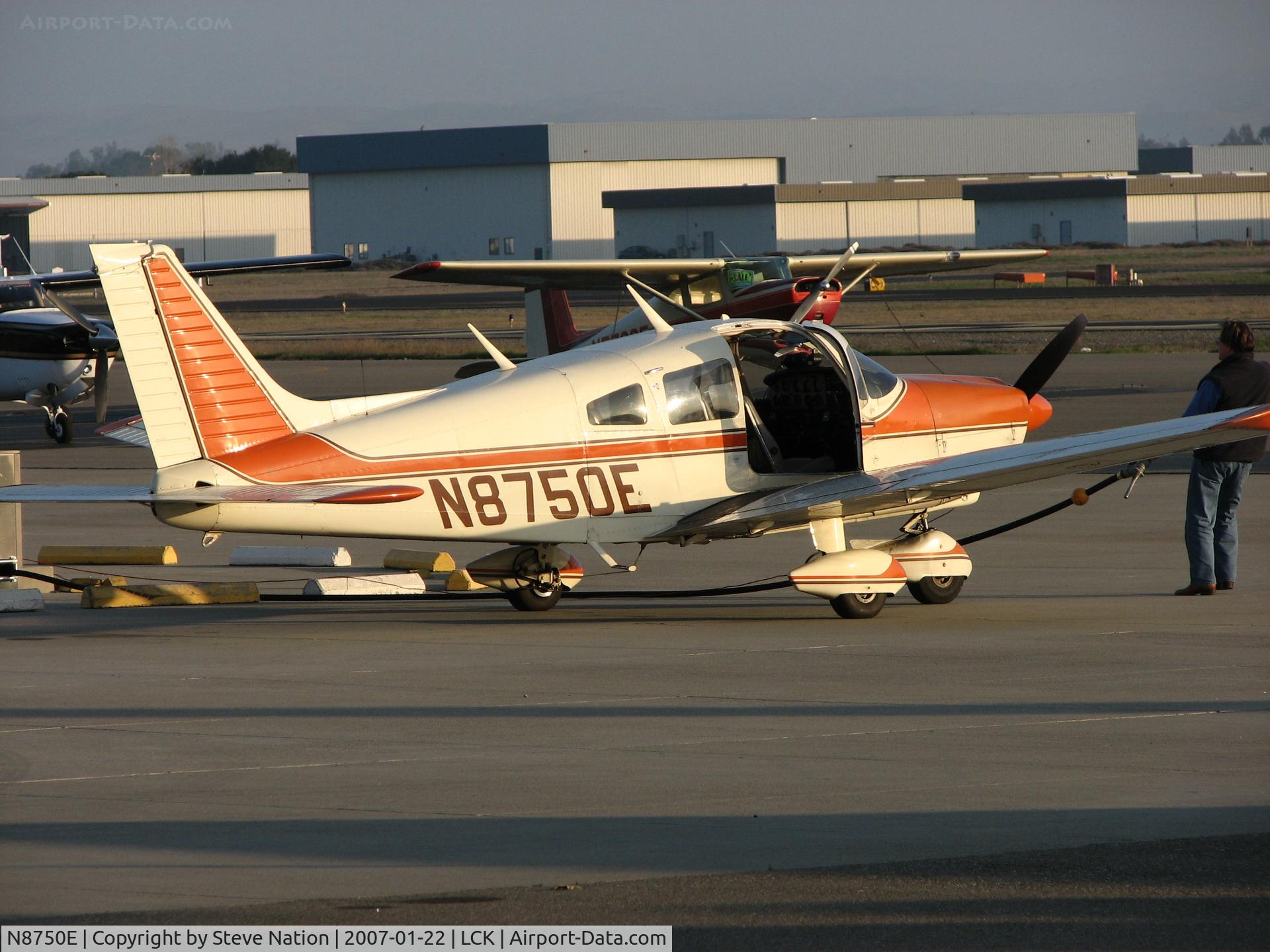 N8750E, 1976 Piper PA-28-181 C/N 28-7690197, Flying Particles 1976 Piper PA-28-181 refueling @ Livermore Municipal Airport, CA