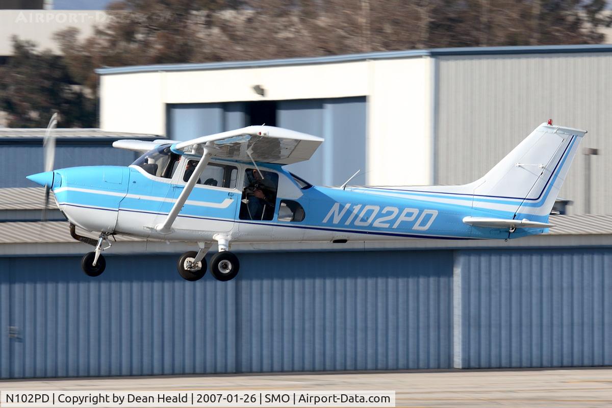 N102PD, 1973 Cessna 172M C/N 17261108, 1973 Cessna 172M N102PD, owned & operated by the Santa Monica Police Department, departing RWY 21. Note the large clear window for ease of observation.