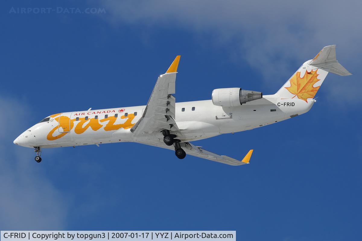 C-FRID, 1994 Canadair CRJ-100ER (CL-600-2B19) C/N 7049, Short final for RWY24R.