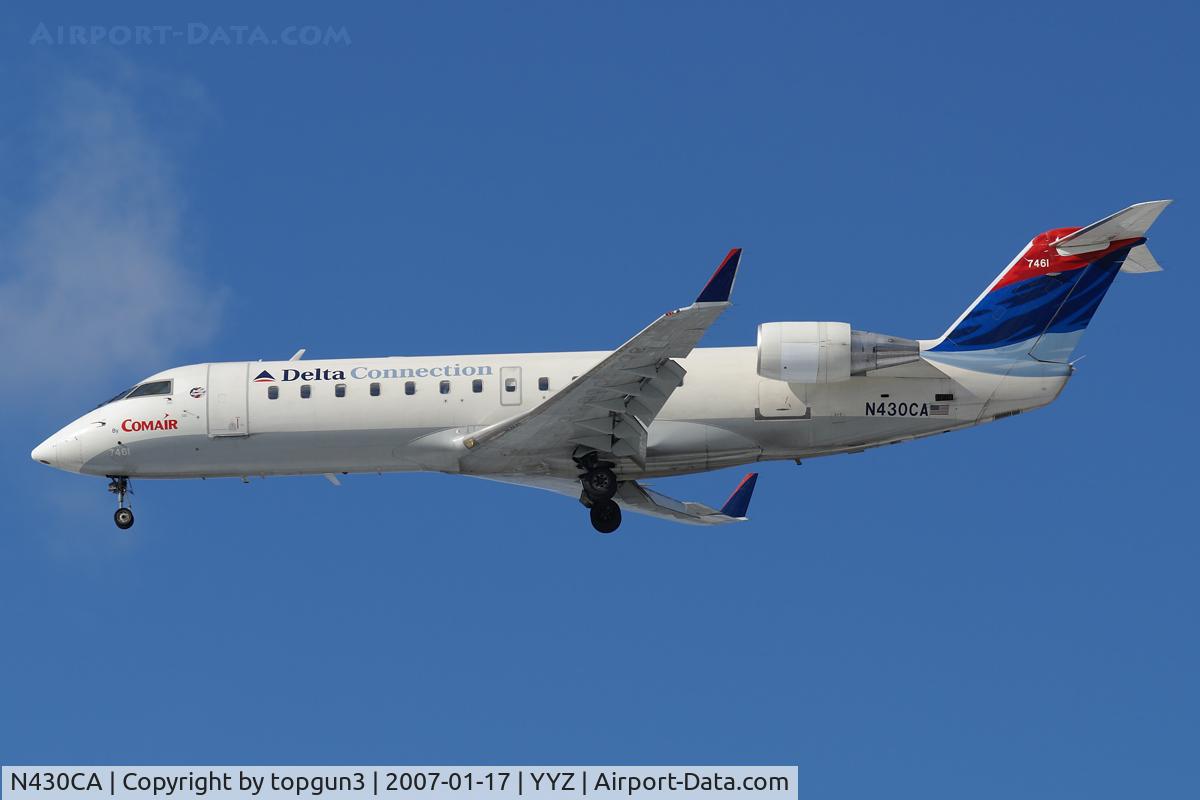 N430CA, 2000 Bombardier CRJ-100ER (CL-600-2B19) C/N 7461, Short final for RWY24L.