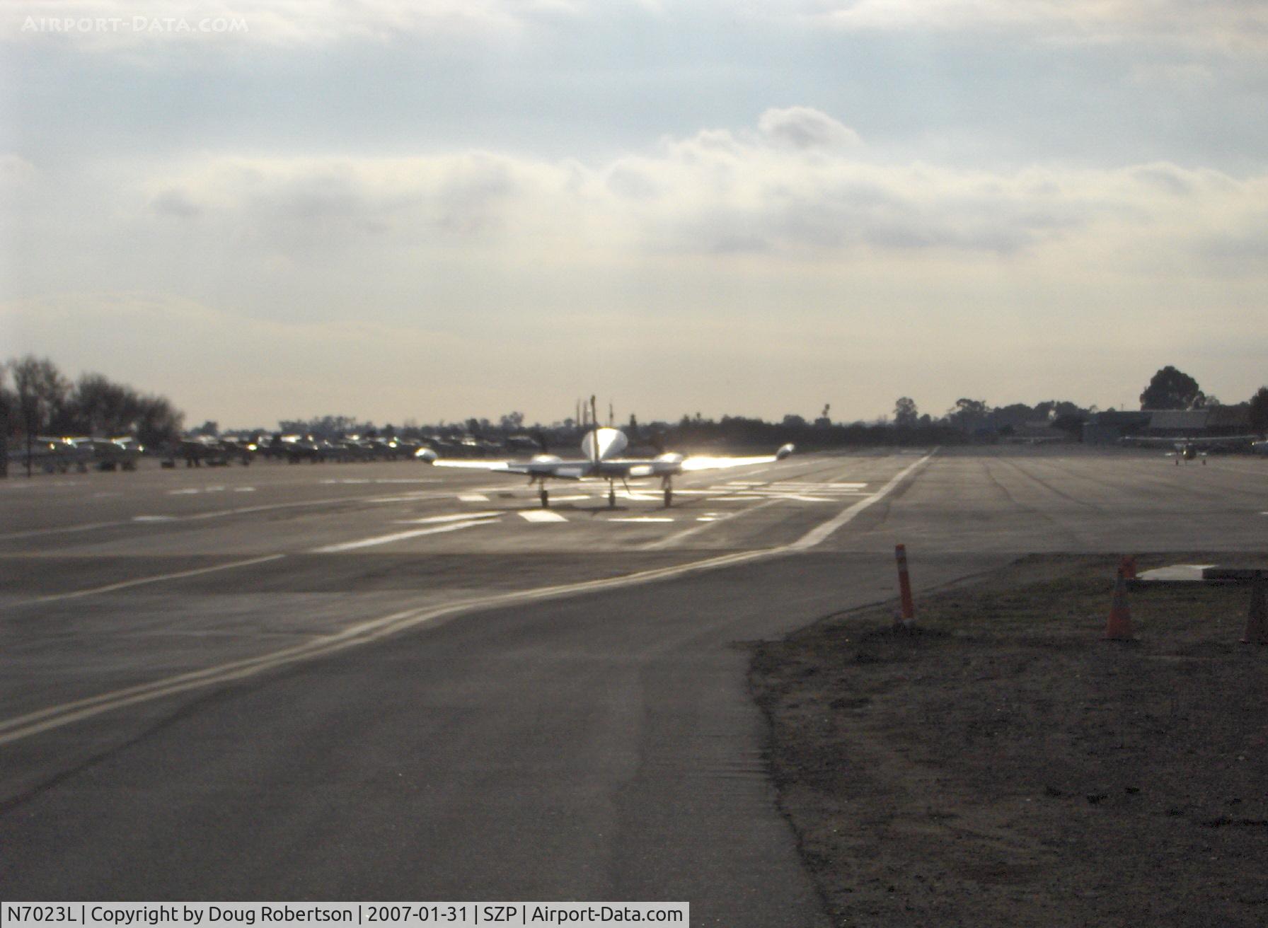 N7023L, 1966 Cessna 310K C/N 310K0123, 1966 Cessna 310K, two Continental IO-470s 260 Hp each, takeoff roll Rwy 22