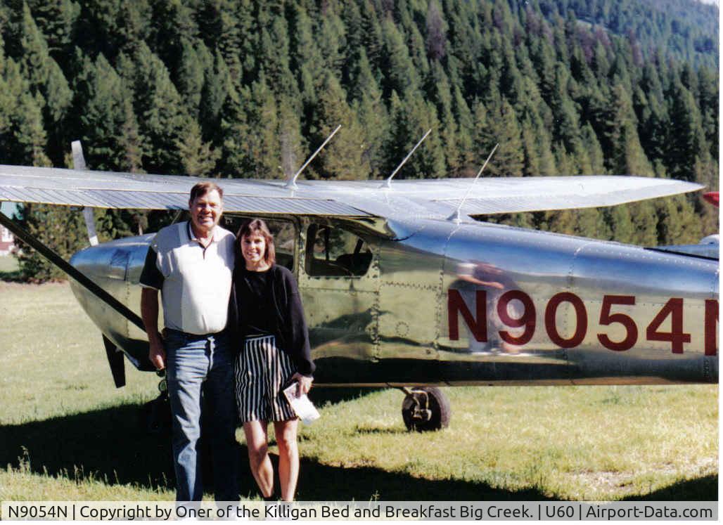N9054N, 1959 Cessna 182B Skylane C/N 51716, Owner and daughter in front of 9054N at Big Creek Idaho landing strip.