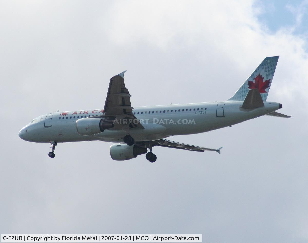 C-FZUB, 2003 Airbus A320-214 C/N 1940, Landing at Orlando
