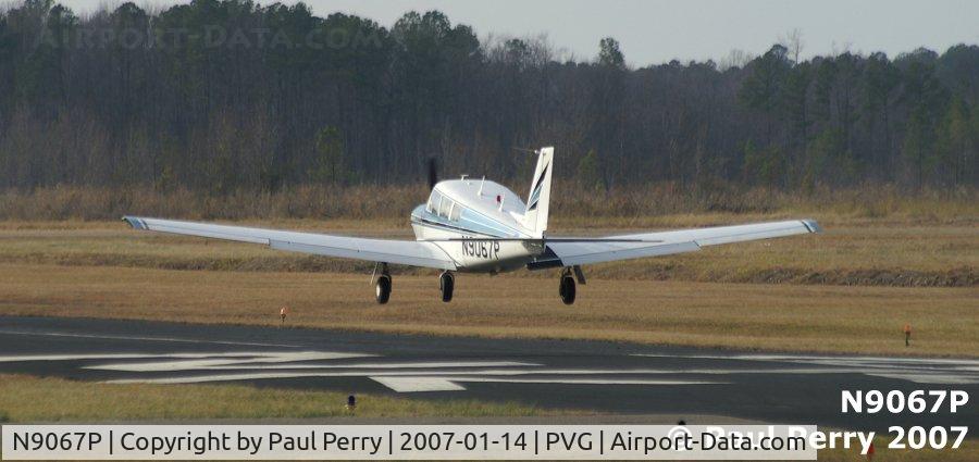 N9067P, 1966 Piper PA-24-260 C/N 24-4535, Touching down, nearly on the numbers