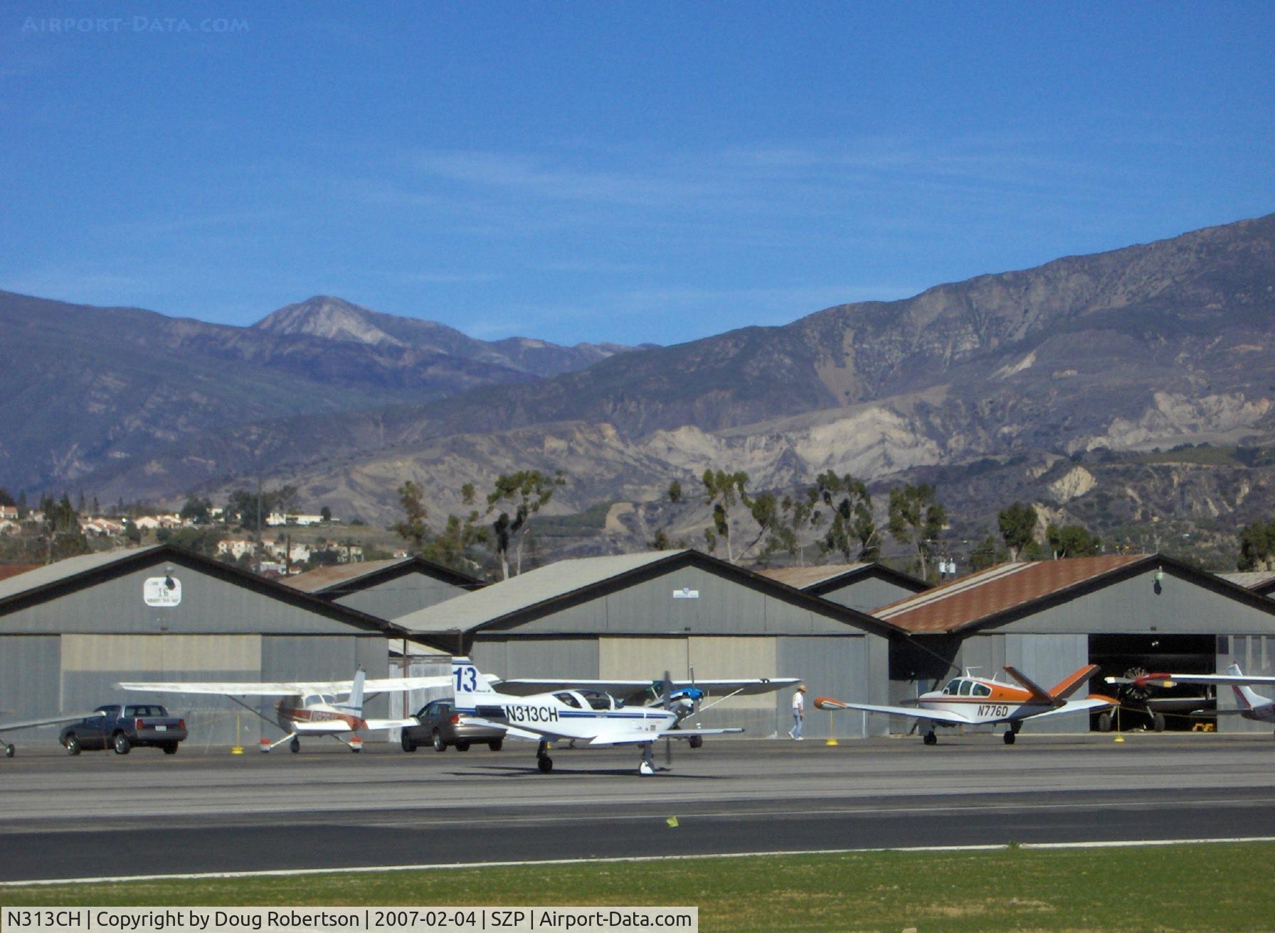 N313CH, 1991 Stoddard-Hamilton Glasair SH-3R C/N 3017, 1991 Hautamaki Glasair III SH-3R, Lycoming IO-540, Reno National Air  Races Sport Class #13, taxi to refuel, Vicki's 'Cruse Missile'