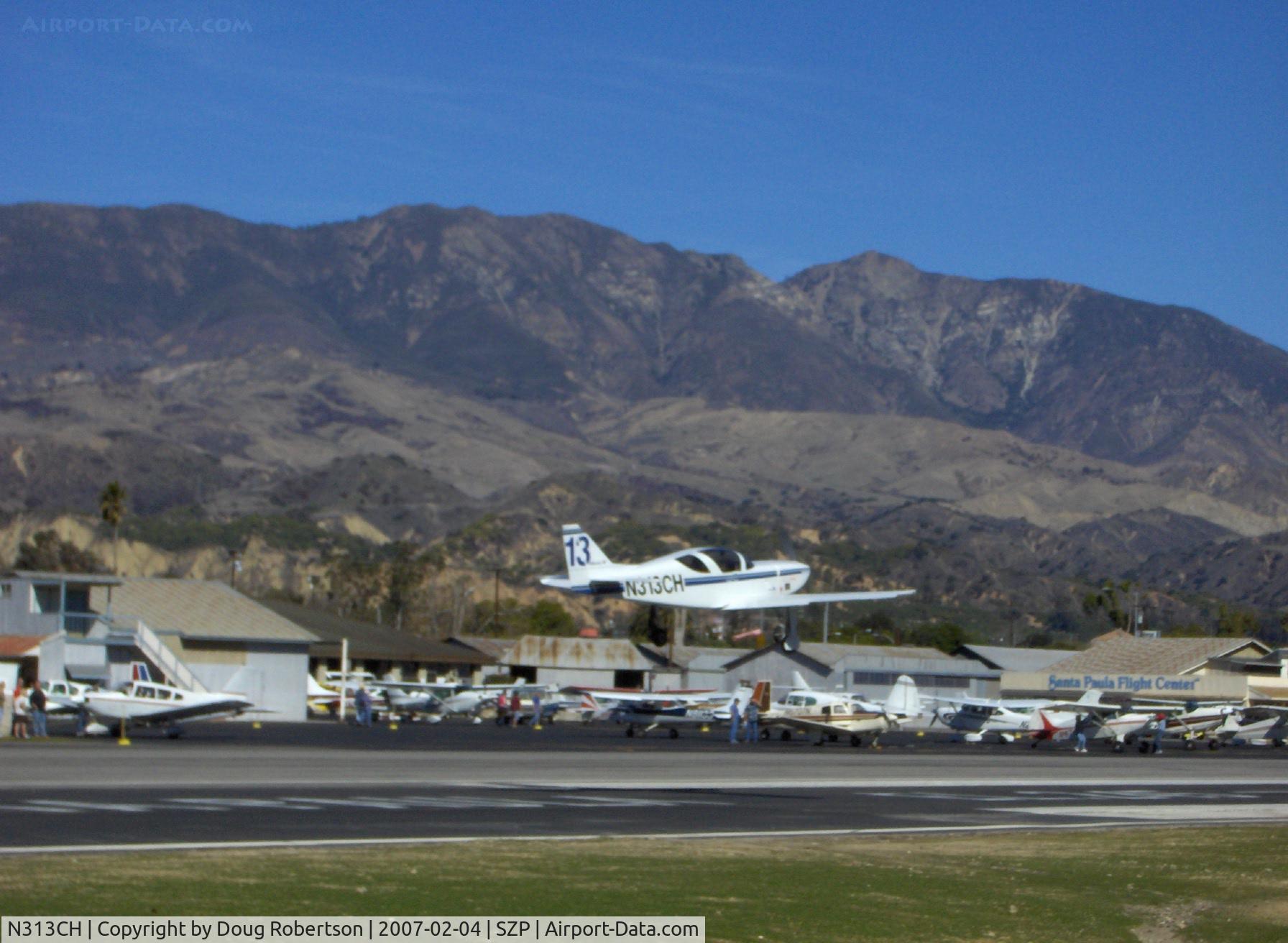 N313CH, 1991 Stoddard-Hamilton Glasair SH-3R C/N 3017, 1991 Hautamaki Glasair III SH-3R, Lycoming IO-540, Reno National Air  Races Sport Class #13, Takeoff climb Rwy 04, Vicki's 'Cruse Missile'