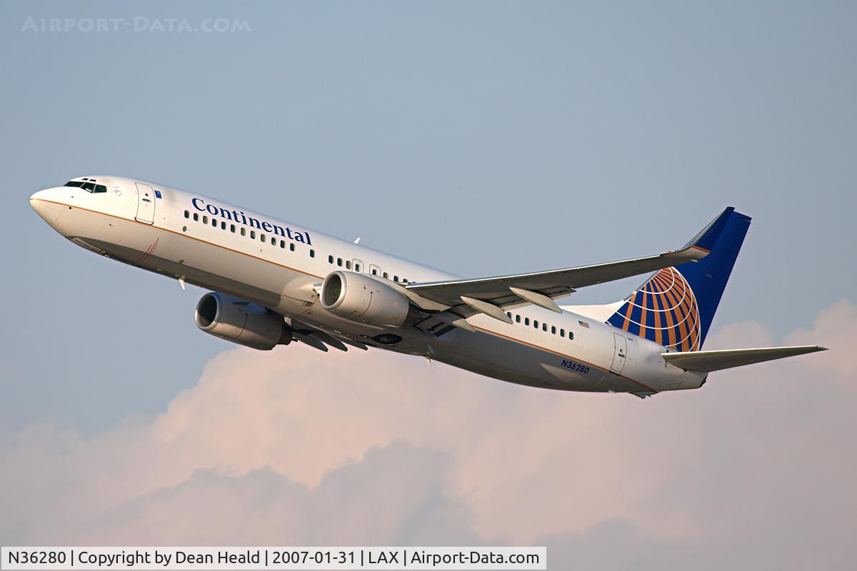 N36280, 2003 Boeing 737-824 C/N 31598, Continental Airlines N36280 (FLT COA1503) climbing out from RWY 25R enroute to Newark/New York Liberty Int'l (KEWR).