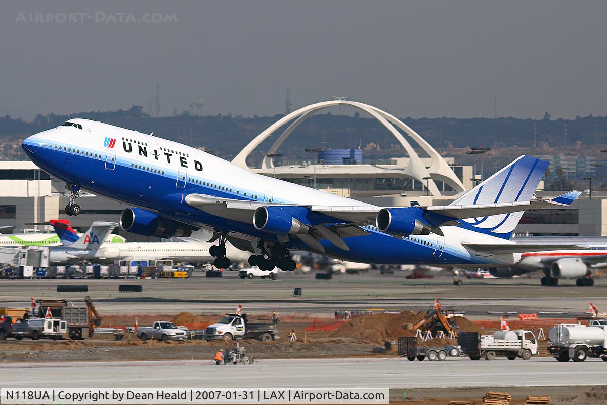 N118UA, 1999 Boeing 747-422 C/N 28811, United Airlines N118UA (FLT UAL891) in new colors, departing RWY 25R enroute to Narita Int'l (RJAA).