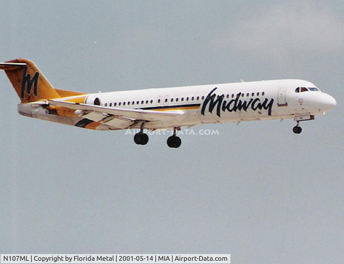 N107ML, 1993 Fokker 100 (F-28-0100) C/N 11450, Midway Fokker 100 landing on Runway 9
