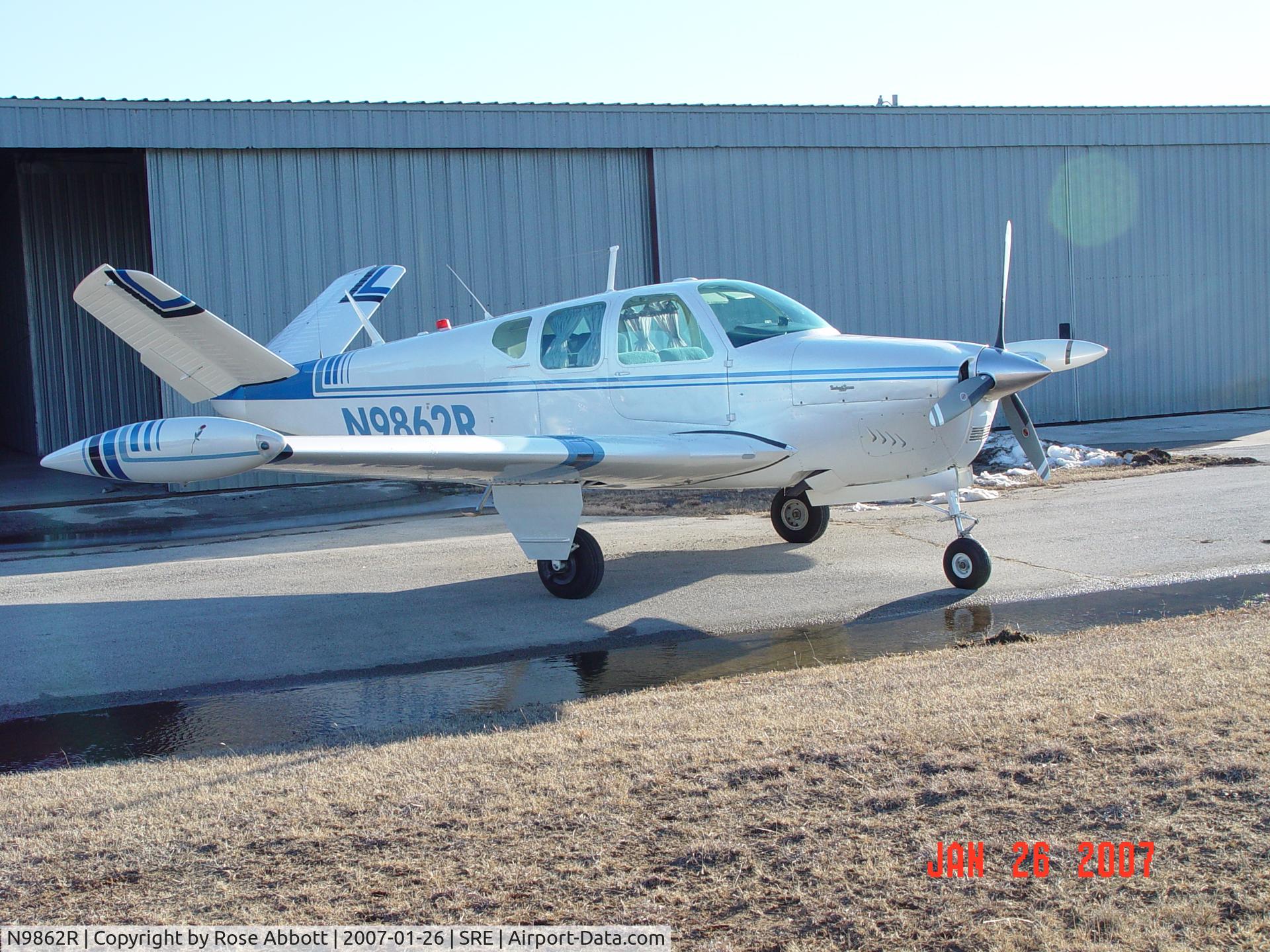 N9862R, 1960 Beech M35 Bonanza C/N D-6409, In front of our hanger at SRE (Seminole, OK)