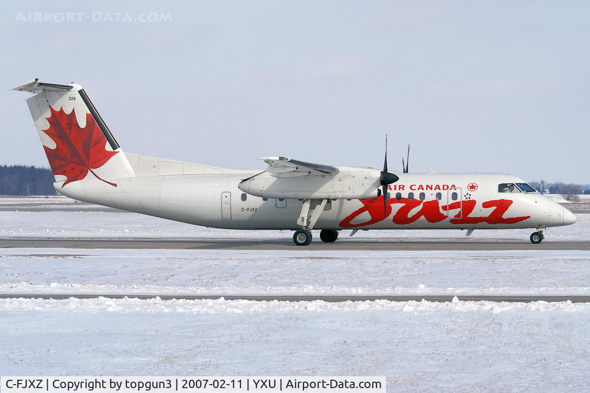 C-FJXZ, 1991 De Havilland Canada DHC-8-311 Dash 8 C/N 264, Taxiing on Golf