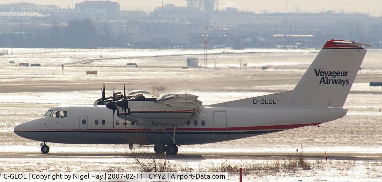 C-GLOL, 1981 De Havilland Canada DHC-7-102 Dash 7 C/N 39, Winter sun shining on, Taxing onto Rwy 23