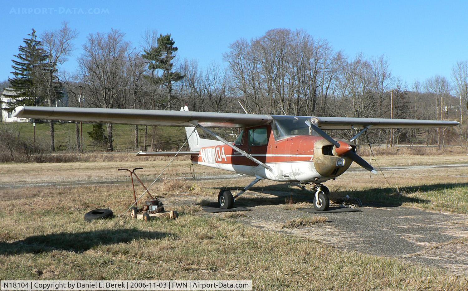 N18104, 1972 Cessna 150L C/N 15073788, Well-worn Cessna Commuter sits it out at Sussex Airport.