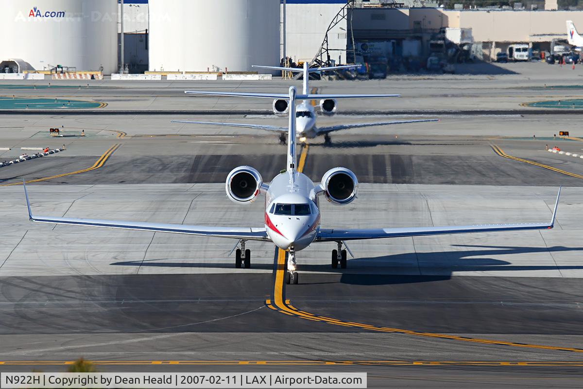 N922H, 2005 Gulfstream Aerospace GIV-X (G450) C/N 4036, Honeywell International Corporation's 2005 Gulfstream G-IV-X (G450) N922H on taxiway ST crossing the recently built, but still unopened RWY 25L. Behind this plane is a 2003 Citaton X - N48HF.
