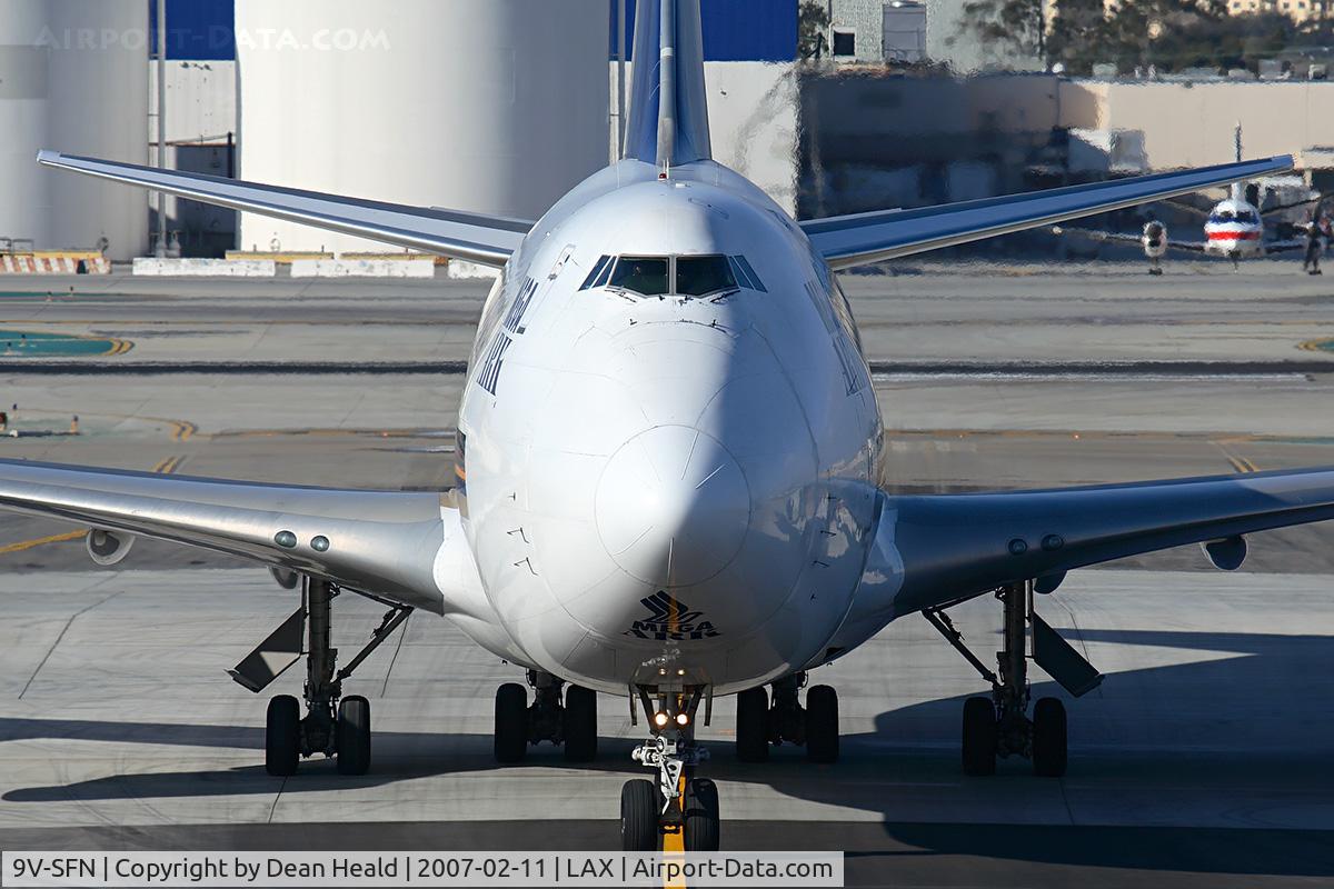 9V-SFN, 2004 Boeing 747-412F/SCD C/N 32899, Singapore Airlines Cargo 9V-SFN (FLT SQC7986) crossing RWY 25L on taxiway ST enroute to the cargo terminal after arrival on the north complex from Ted Stevens Anchorage Int'l (PANC).