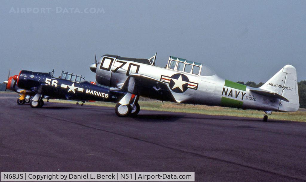 N68JS, 1945 North American SNJ-6 Texan C/N 121-43033, Nice AT-6 on display at an airshow in the early 1990s.
