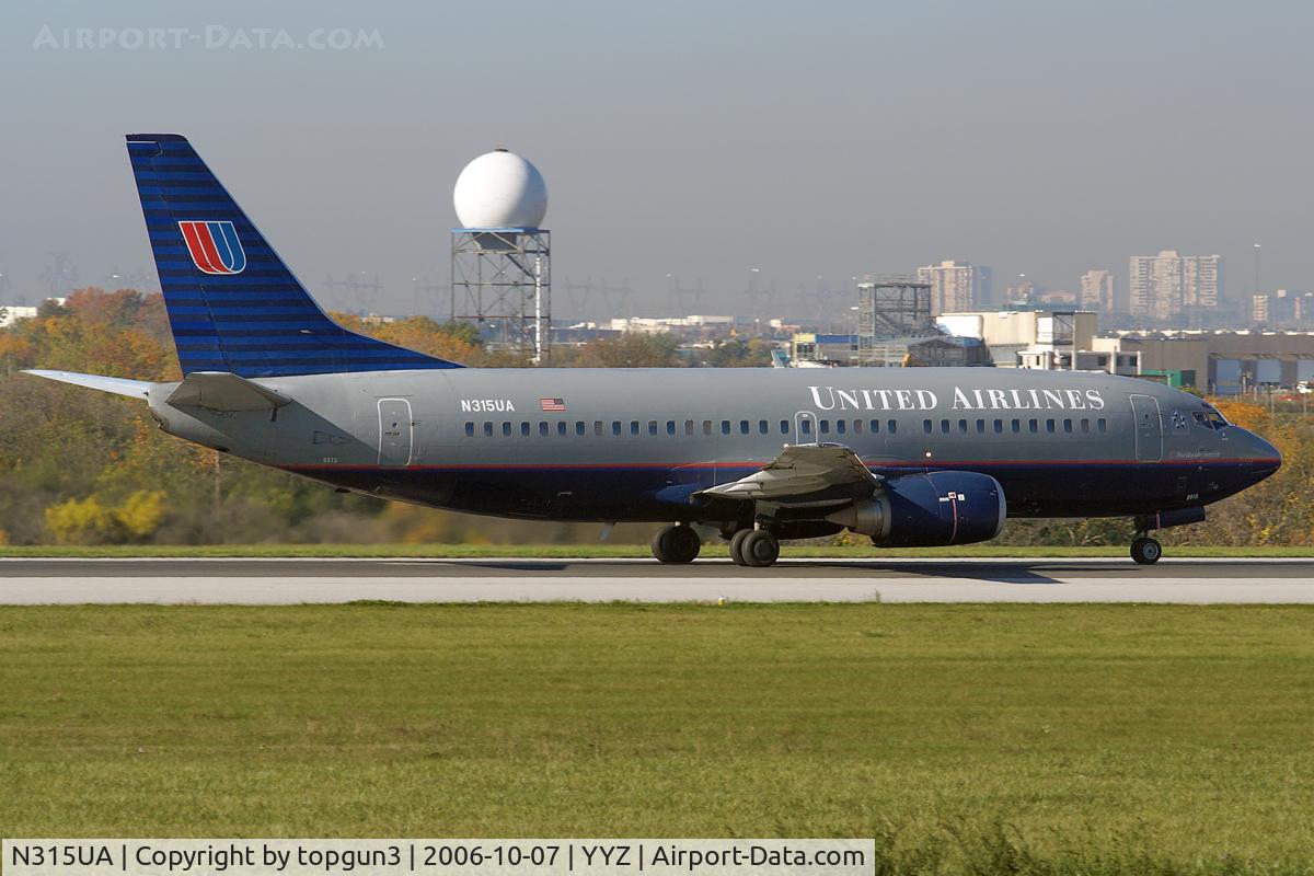 N315UA, 1987 Boeing 737-322 C/N 23947, Departing via RWY33L.