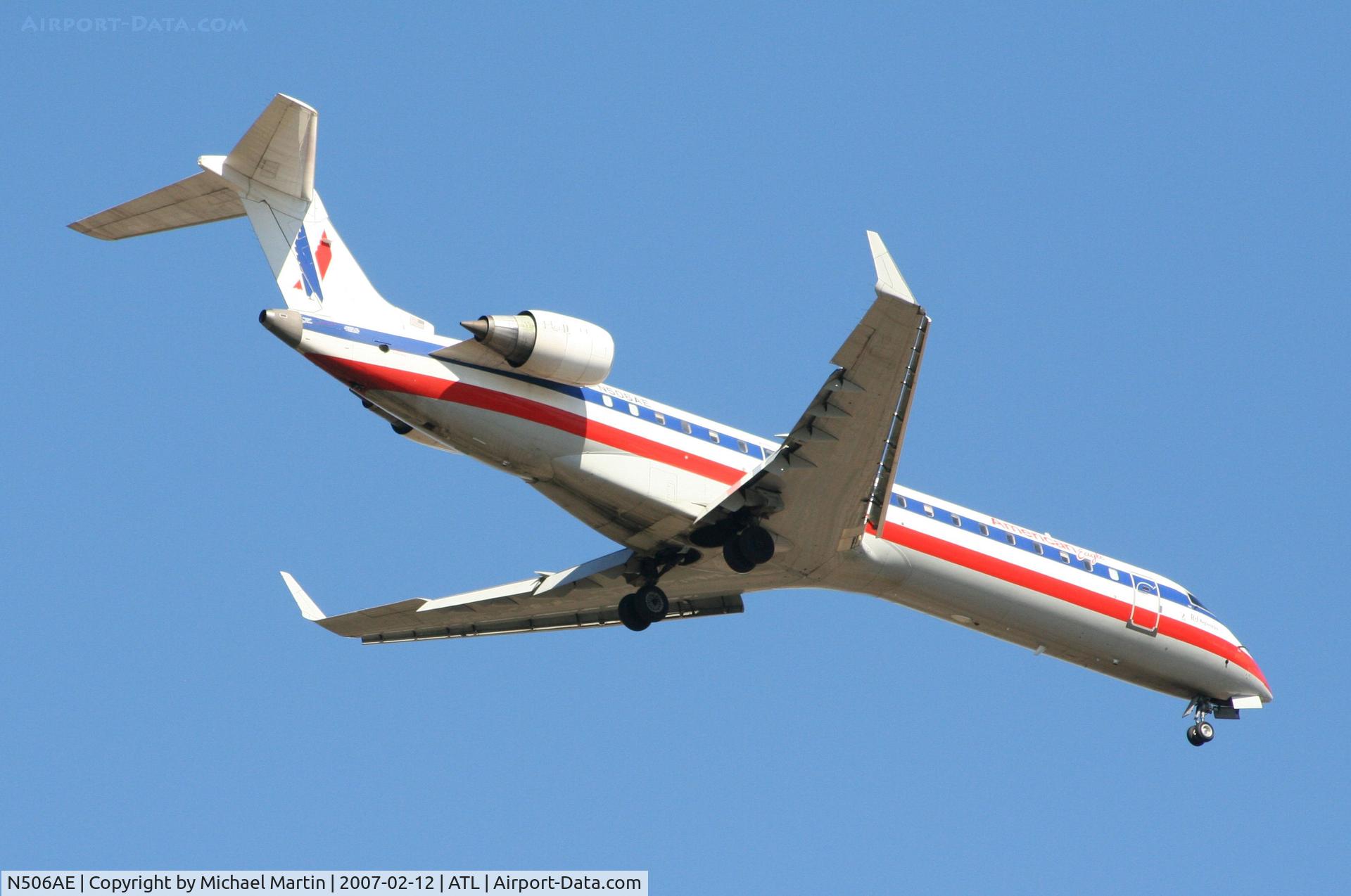 N506AE, 2002 Bombardier CRJ-701ER (CL-600-2C10) Regional Jet C/N 10056, Over the numbers of 9R
