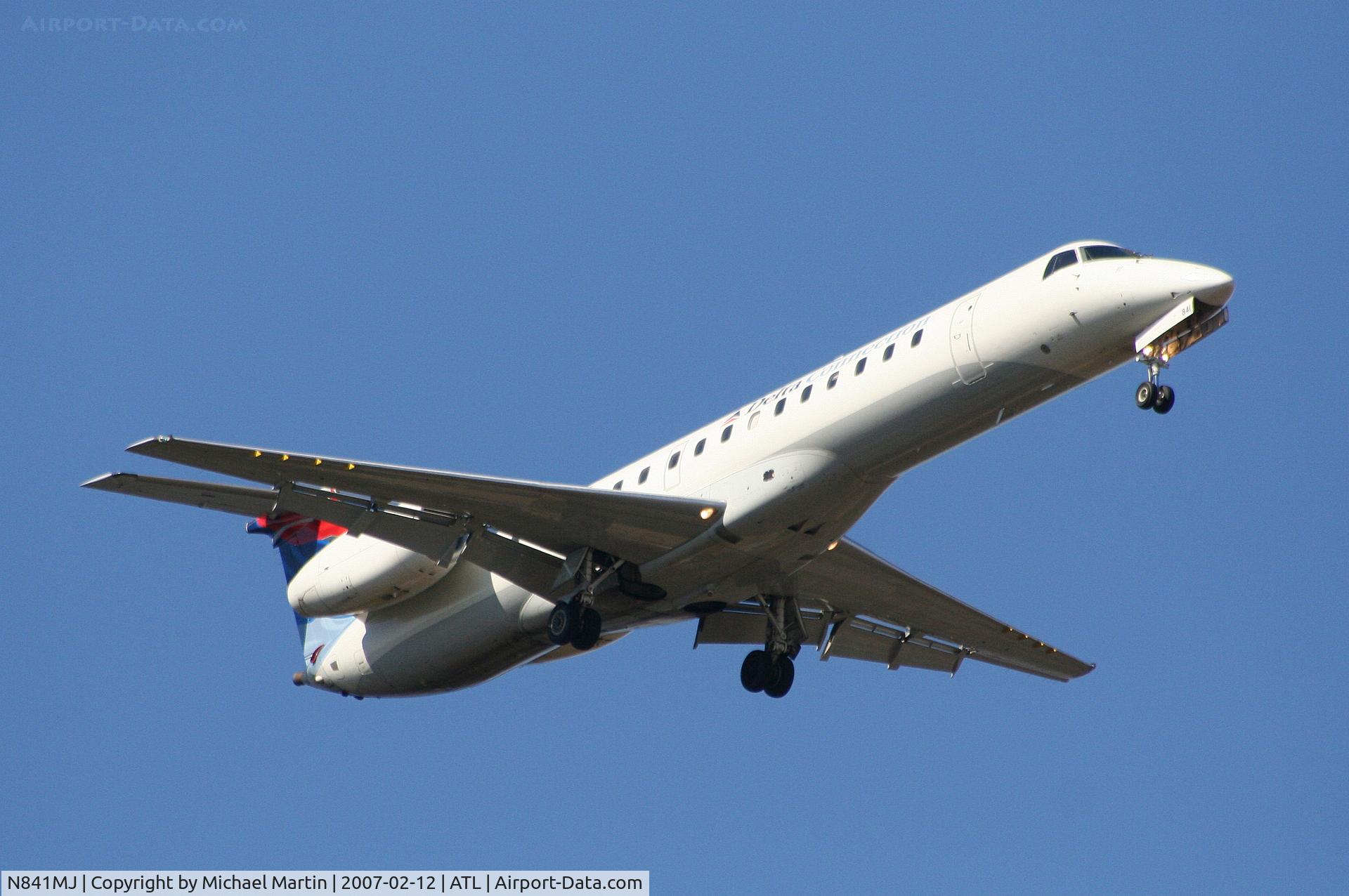 N841MJ, 2001 Embraer EMB-145LR C/N 145448, On final for Runway 9R