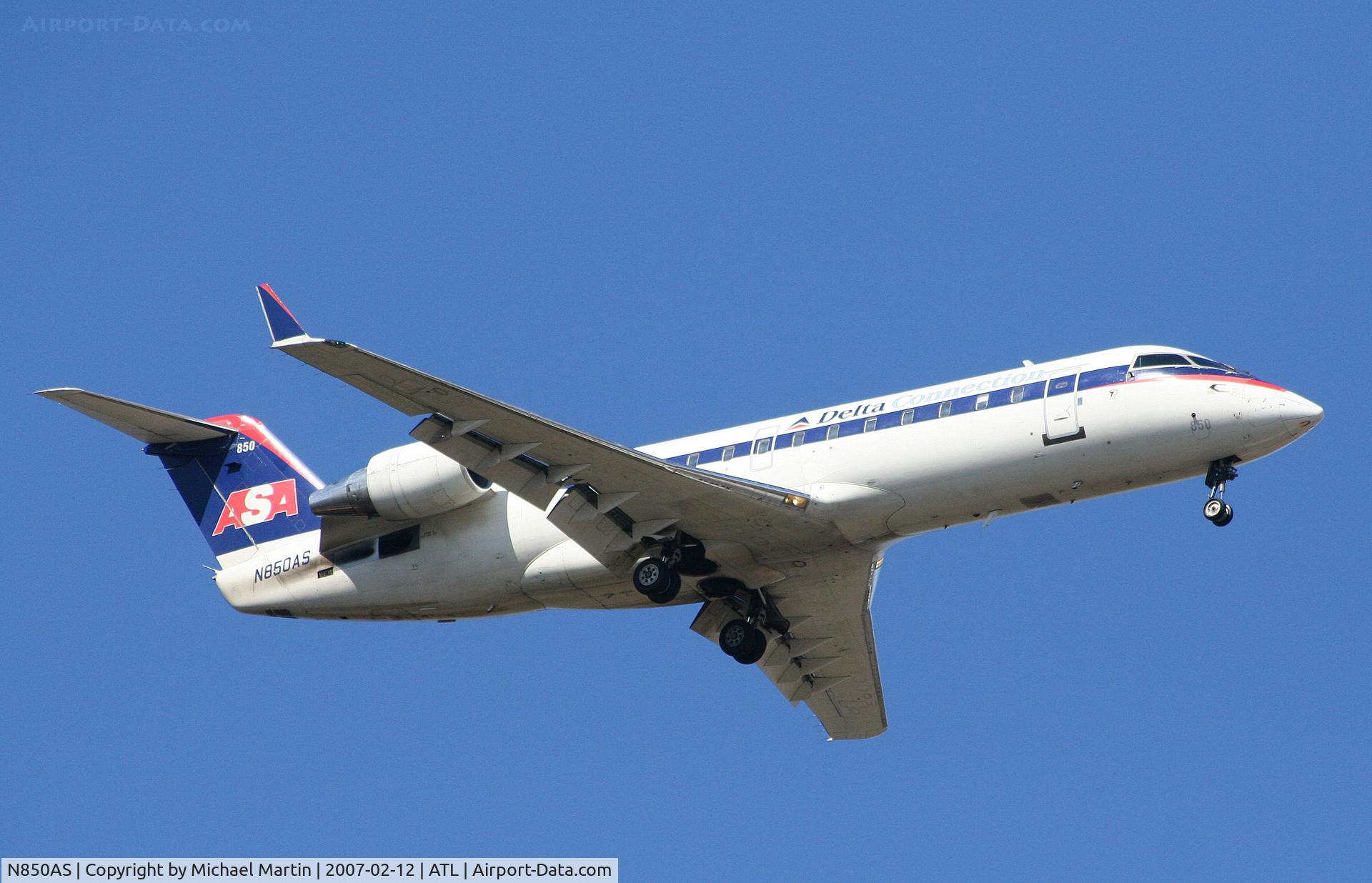 N850AS, 1999 Bombardier CRJ-200ER (CL-600-2B19) C/N 7355, On final for Runway 9R