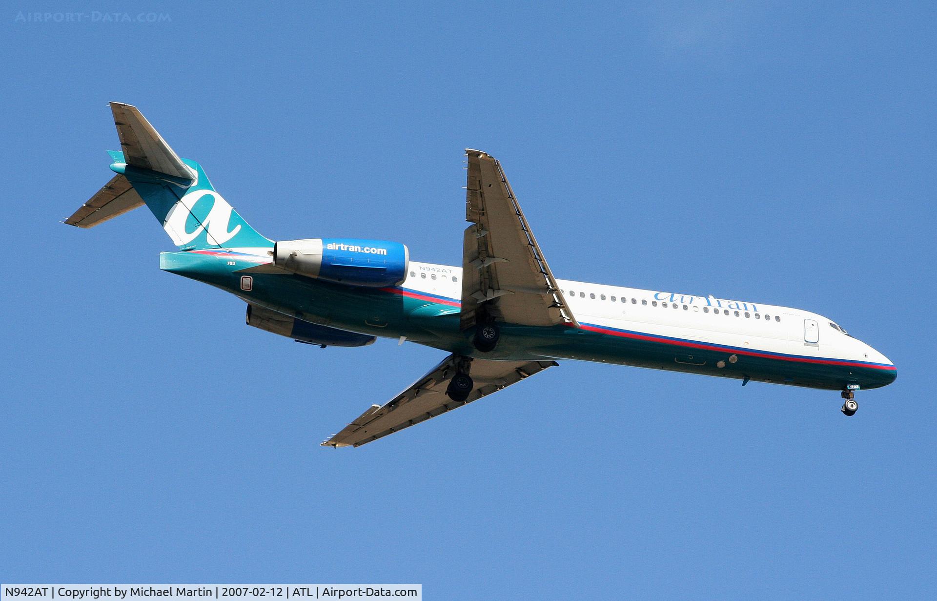 N942AT, 1999 Boeing 717-200 C/N 55005, On final for Runway 9R