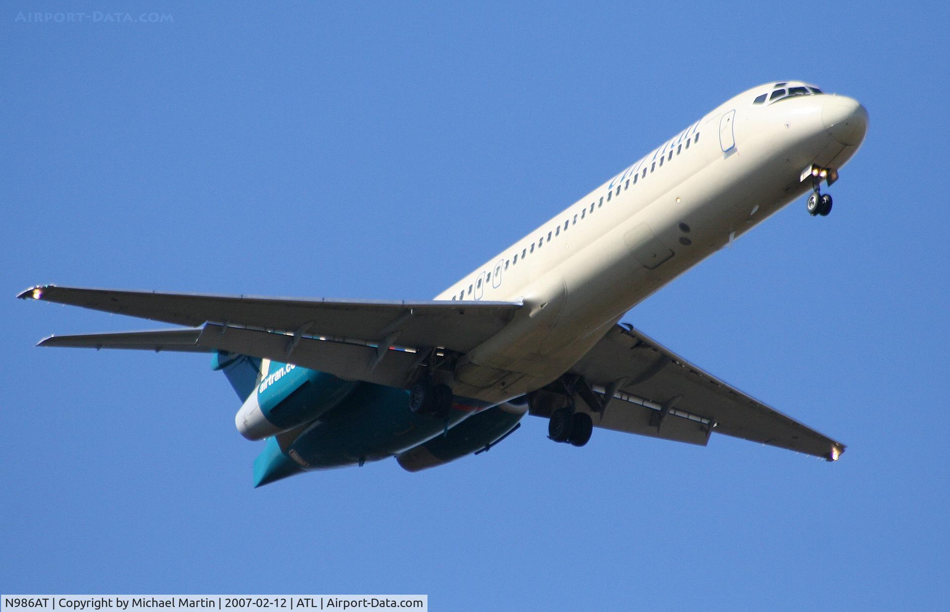 N986AT, 2001 Boeing 717-200 C/N 55089, On final for Runway 9R