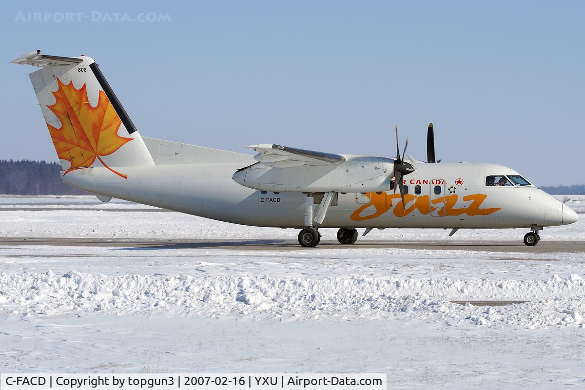 C-FACD, 1989 De Havilland Canada DHC-8-102 Dash 8 C/N 150, Taxiing on Golf