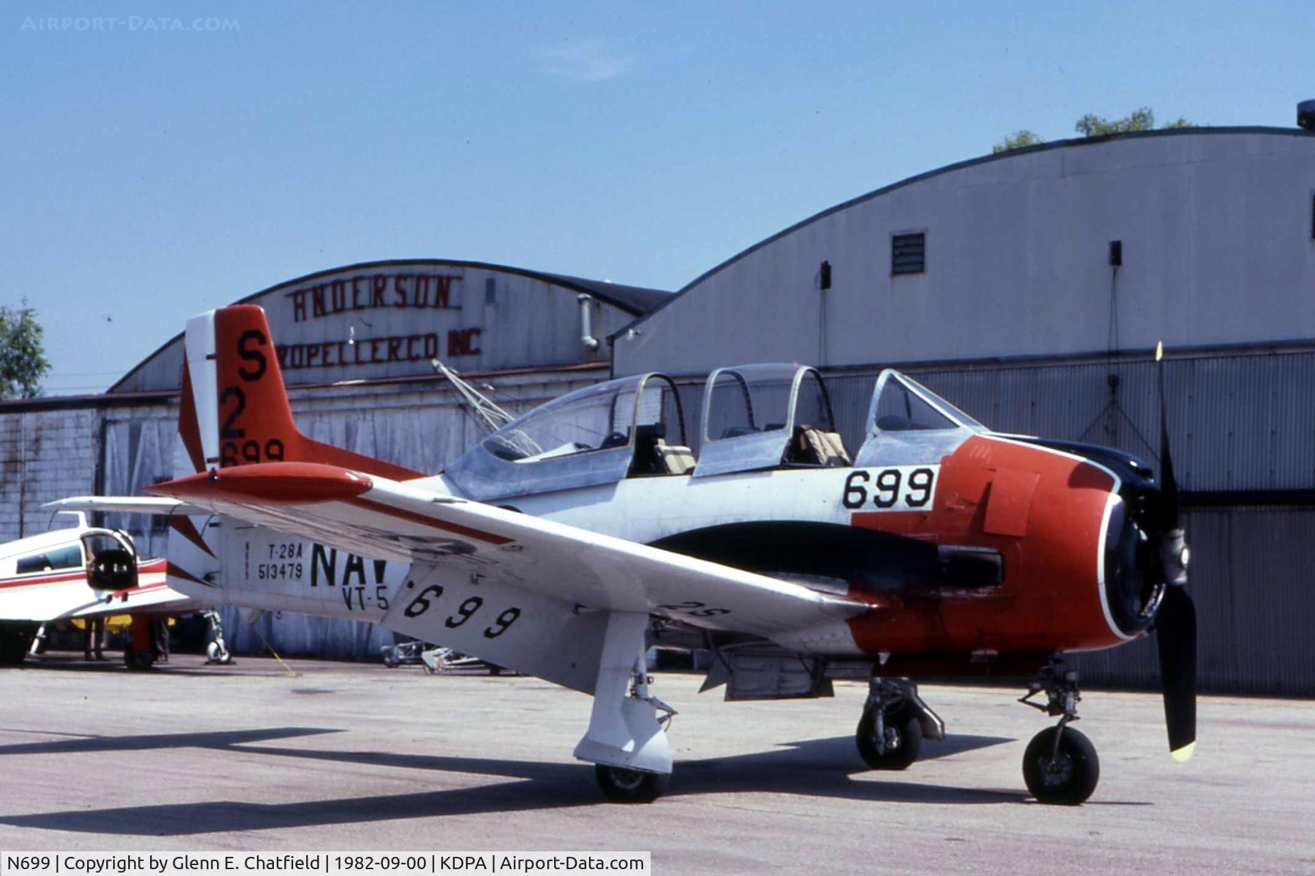 N699, 1966 North American T-28A Trojan C/N 51-3479A, Just visiting Andy's Prop Shop