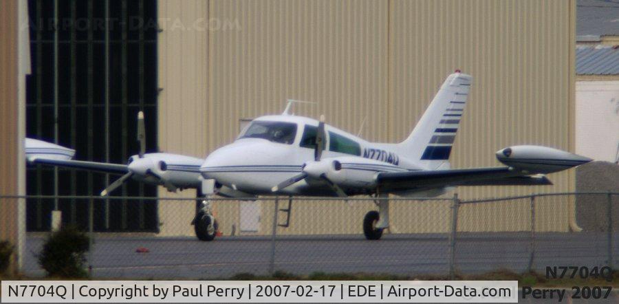N7704Q, 1970 Cessna T310Q C/N T310Q0204, Front view of this twin seen from off the airport