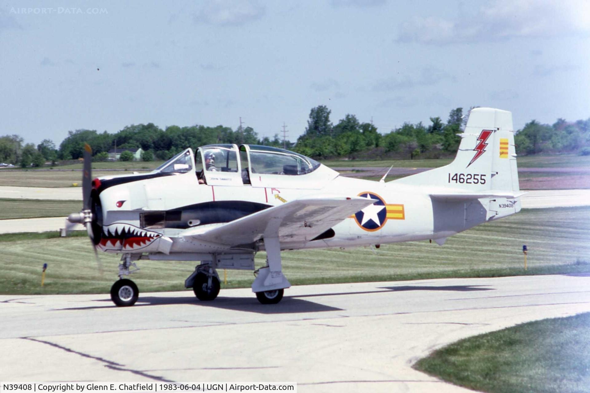 N39408, 1954 North American T-28C Trojan C/N 252-18 (146255), Taxiing in from fly by