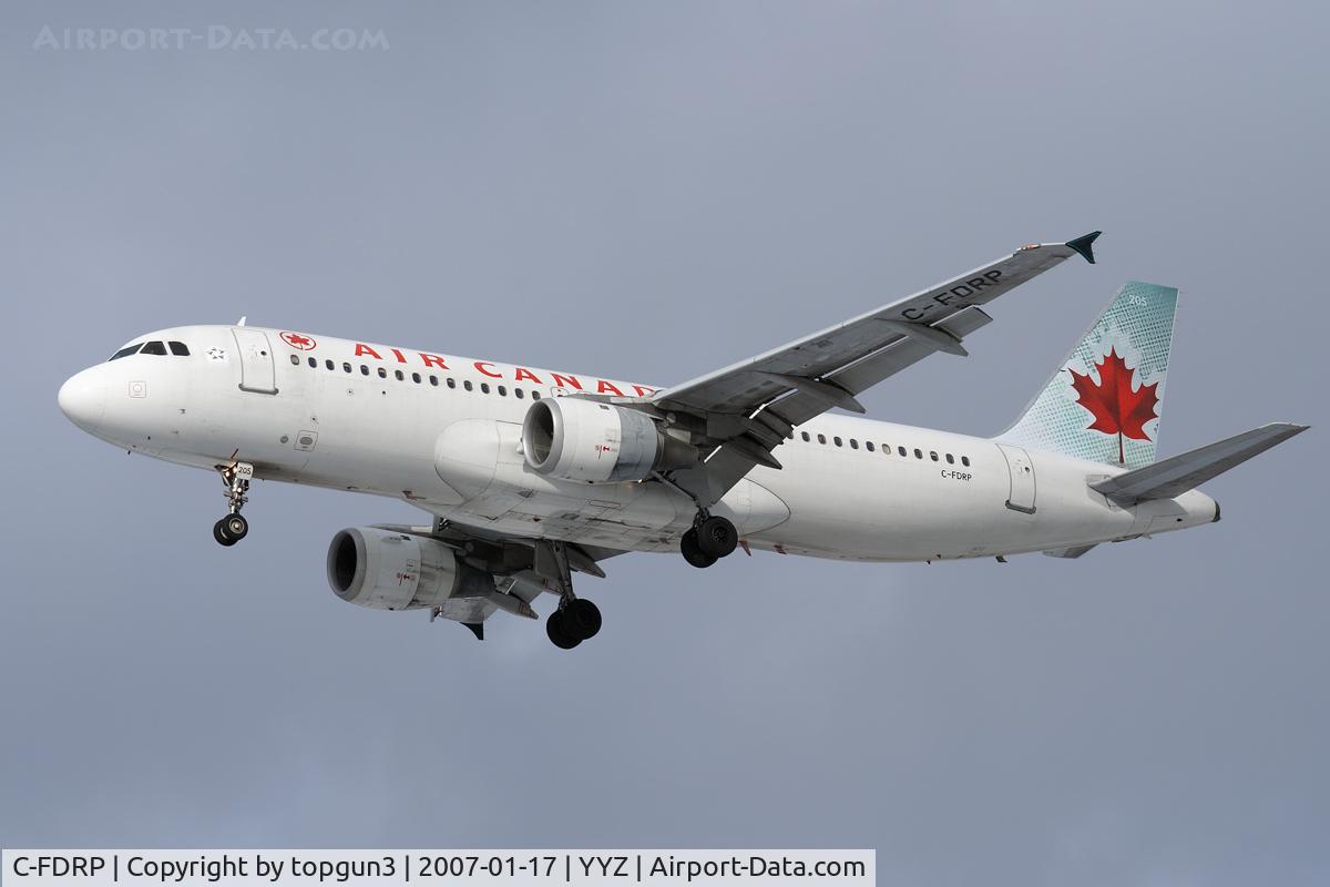 C-FDRP, 1990 Airbus A320-211 C/N 122, Short final for RWY24R.