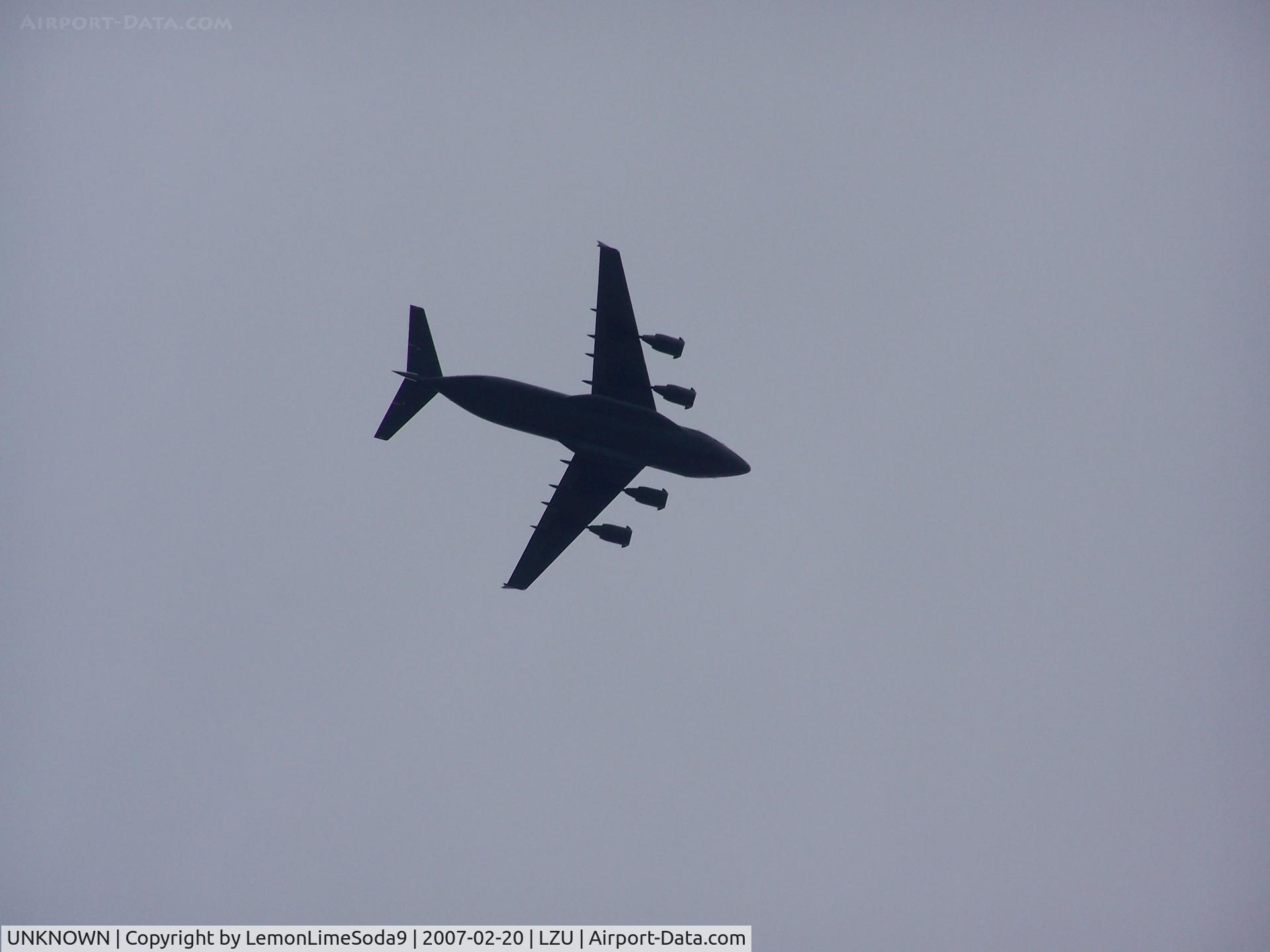 UNKNOWN, , A low flying C-17 over LZU.