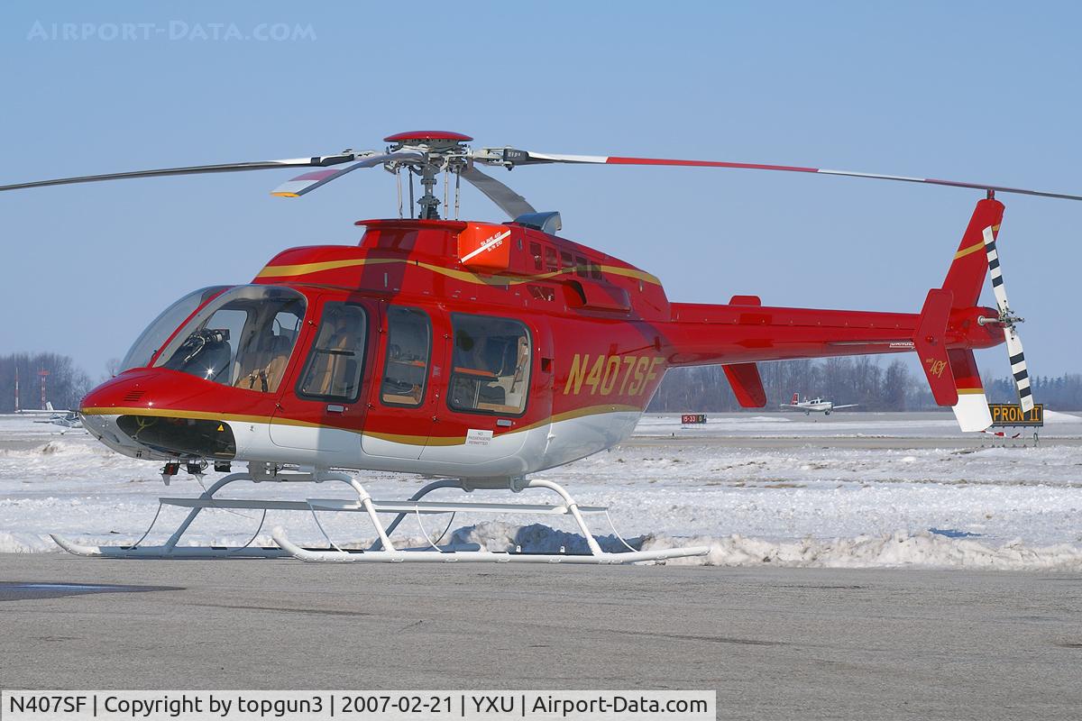 N407SF, Bell 407 C/N 53737, Parked at ESSO ramp.