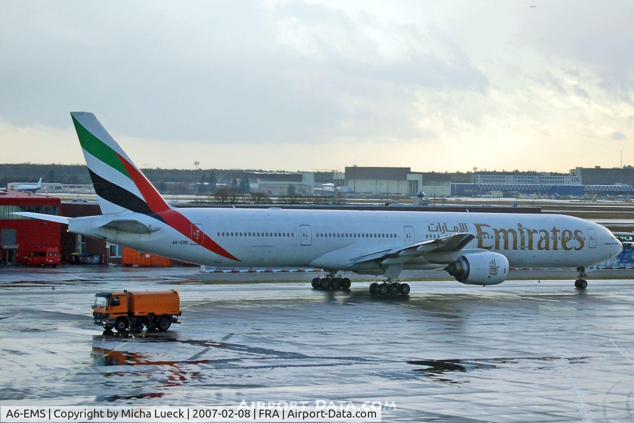 A6-EMS, 2002 Boeing 777-31H C/N 29067, Between two showers...