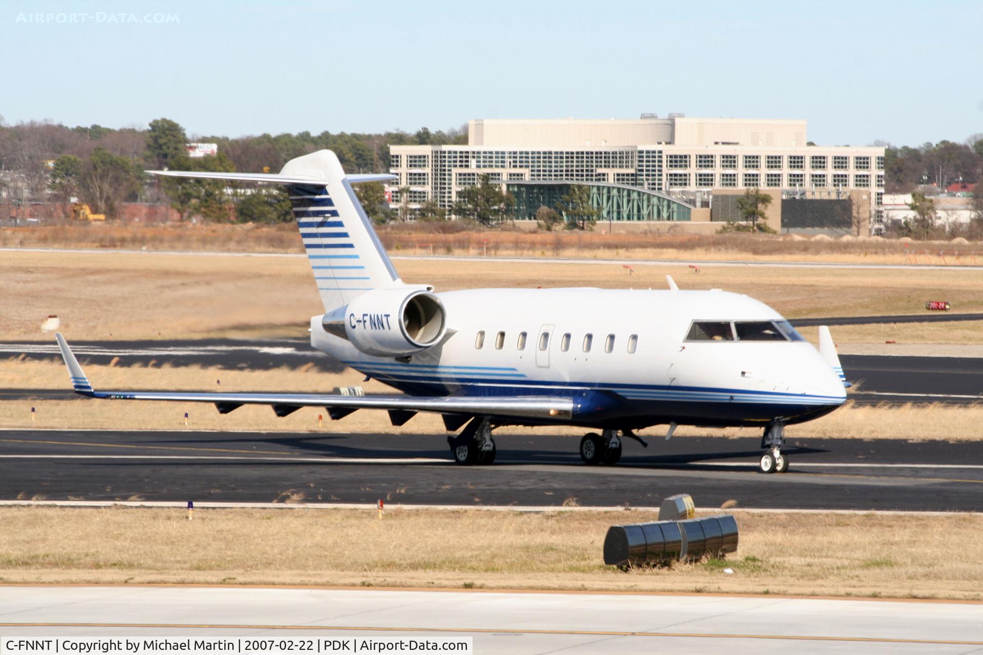C-FNNT, 1996 Canadair Challenger 604 (CL-600-2B16) C/N 5317, Taxing to Mercury Air Center
