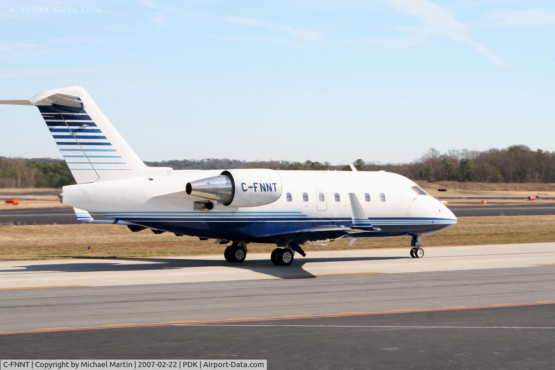 C-FNNT, 1996 Canadair Challenger 604 (CL-600-2B16) C/N 5317, Taxing to Mercury Air Center